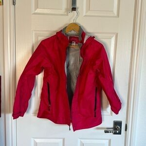 REI rain jackets. Bright pink. Cute and dry! Well made.